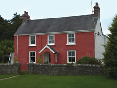 Well proportioned, lime roughcast and traditional limewashed house